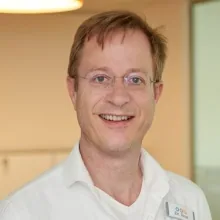 Dr. med. Robert Real